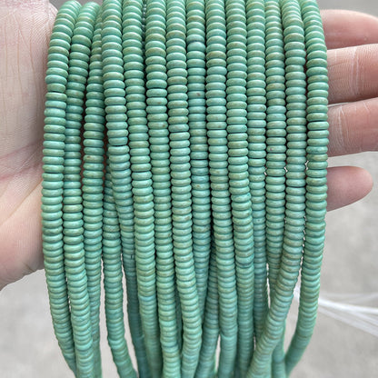 2 * 6M synthetic turquoise disc spacer beads