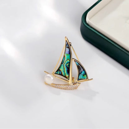 Small sail brooch