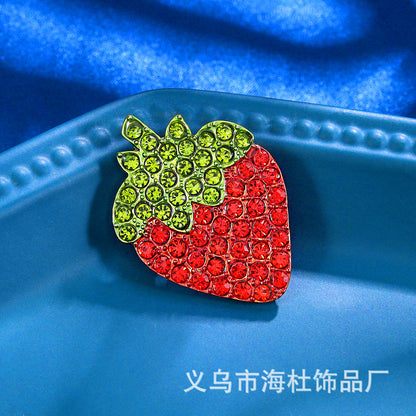 Simple red strawberry brooch with diamonds