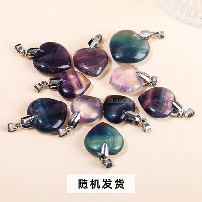 Natural color fluorite love heart pendant.