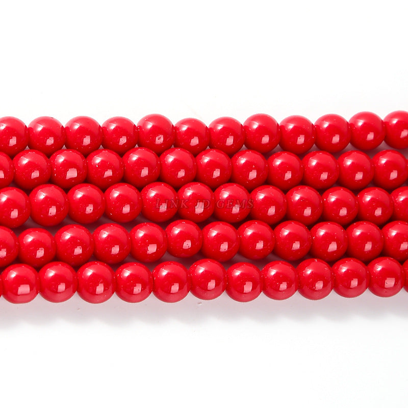 Red lacquered synthetic beads