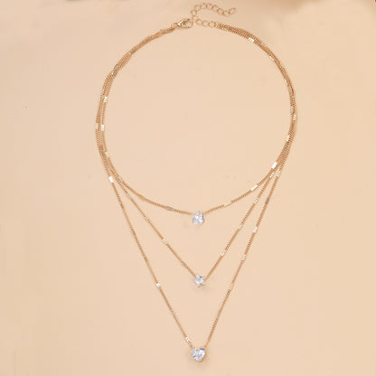 Multi-layered star heart necklace