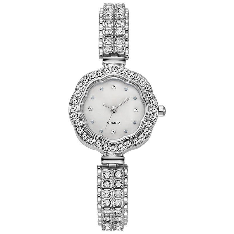 Reloj de mujer con diamantes de imitación y flores 