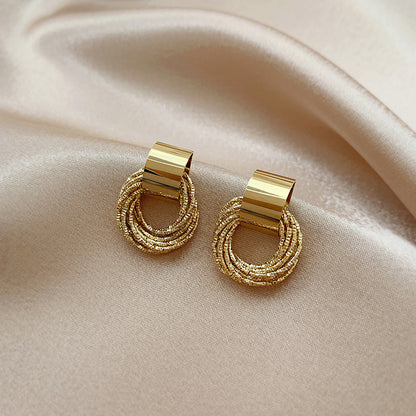 Hollow circle multi-layer winding stud earrings