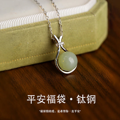 Imitation Hetian jade lucky bag titanium steel necklace