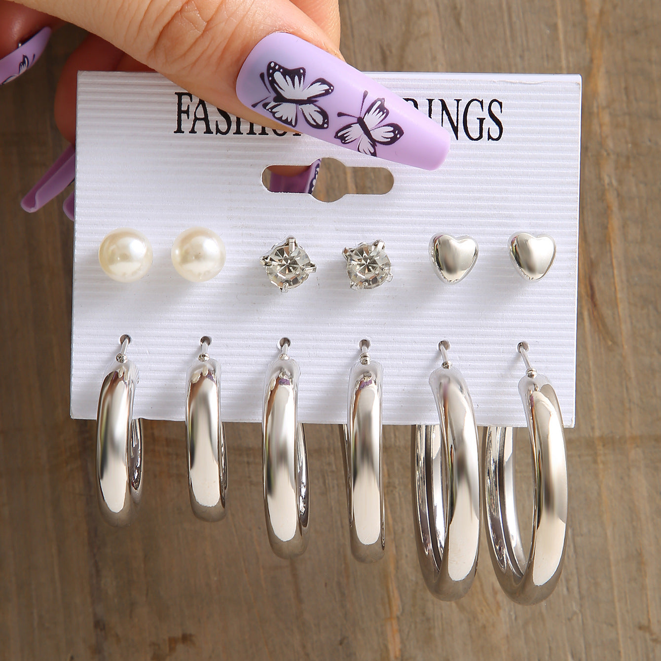 Metal C-shaped earrings set 6 pieces