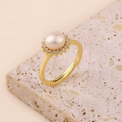 Anillo de perla natural de agua dulce con trébol de cuatro hojas 