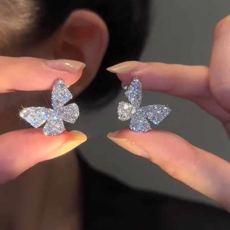 Diamond butterfly stud earrings