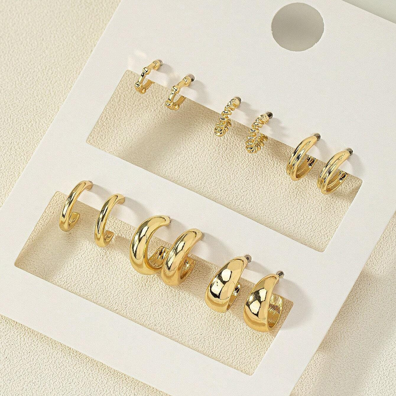 Gold twist earrings set 9 pieces