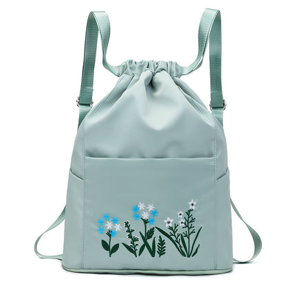 Foldable embroidered travel bag