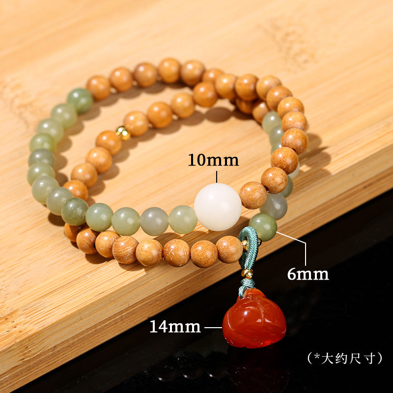 Natural sapphire round bead sandalwood bracelet.