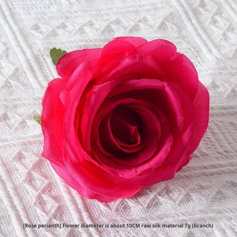 Artificial rose red and orange flowers