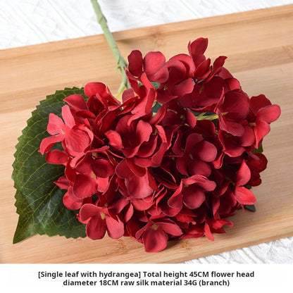 Burgundy themed artificial flowers